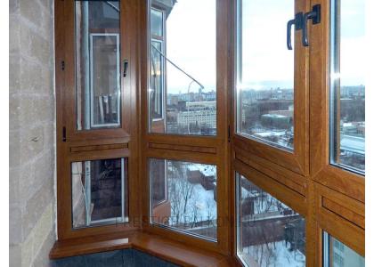 Французское остекление балкона профилем Veka с ламинированием под дерево в Люберцах