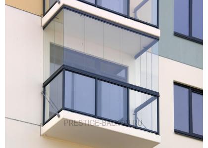 Безрамное остекление балкона с внешней отделкой в Люберцах