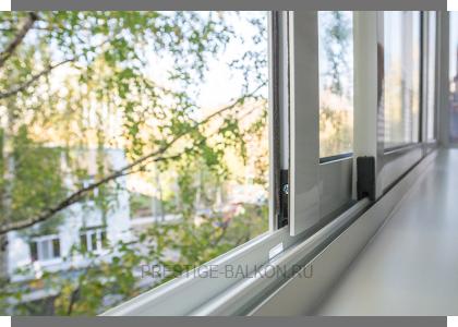 Раздвижное холодное остекление балкона с шумопонижающими отливами в Люберцах