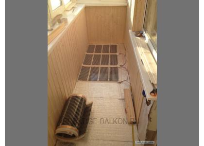 Теплое остекление лоджии пластиковыми окнами с теплым пленочным ИК полом в Люберцах